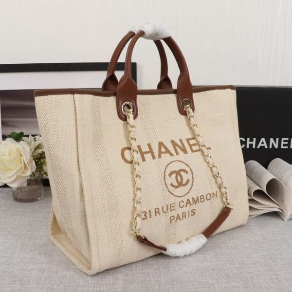 e2c23fb38f6560ef0a9c539411269deb CHANEL Woven Straw Raffia Striped MediumDeauville Tote